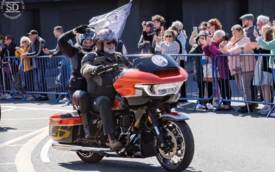 Si King leading the Dave Day procession into Barrow, 8 June 2024. Photo by Simon Dunkerley.